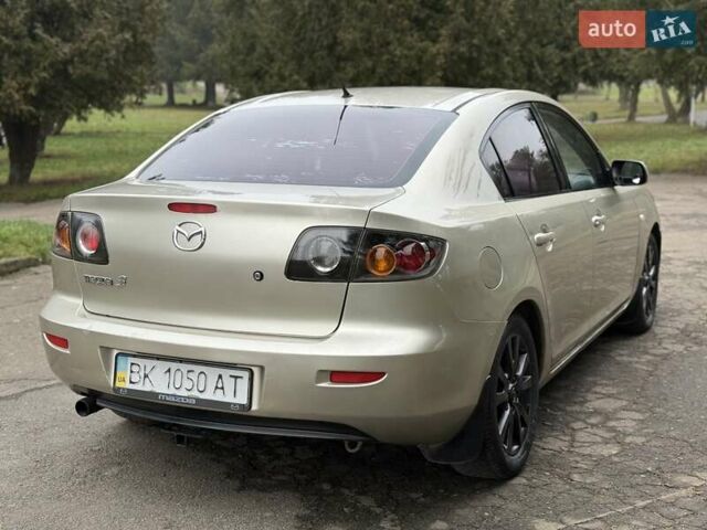Бежевый Мазда 3, объемом двигателя 1.6 л и пробегом 220 тыс. км за 3499 $, фото 22 на Automoto.ua