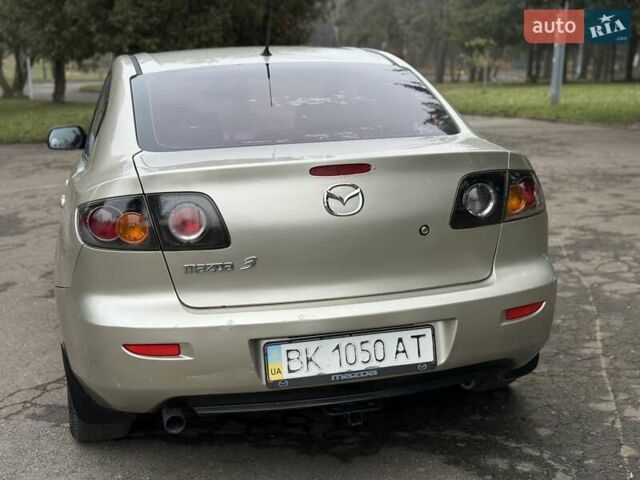 Бежевый Мазда 3, объемом двигателя 1.6 л и пробегом 220 тыс. км за 3499 $, фото 28 на Automoto.ua