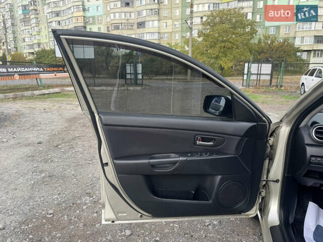 Мазда 3 2006 у Полтаві на Automoto.ua Бежевий Мазда 3, об'ємом двигуна 1.6 л та пробігом 193 тис. км за 6500 $, фото 22 на Automoto.ua