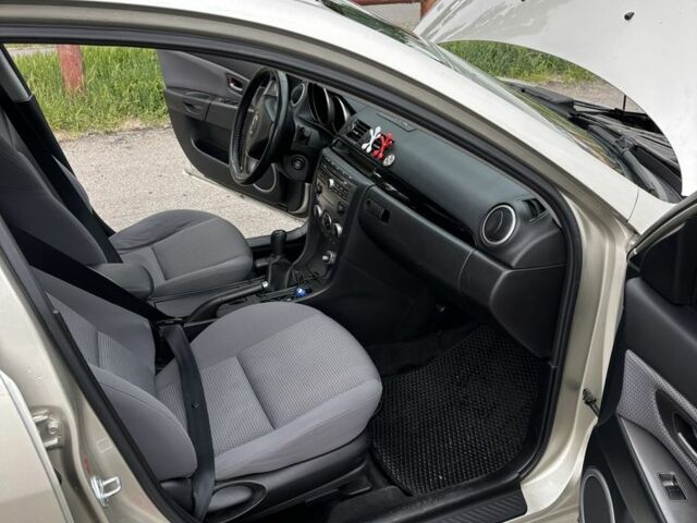 Бежевий Мазда 3, об'ємом двигуна 1.6 л та пробігом 116 тис. км за 5100 $, фото 7 на Automoto.ua