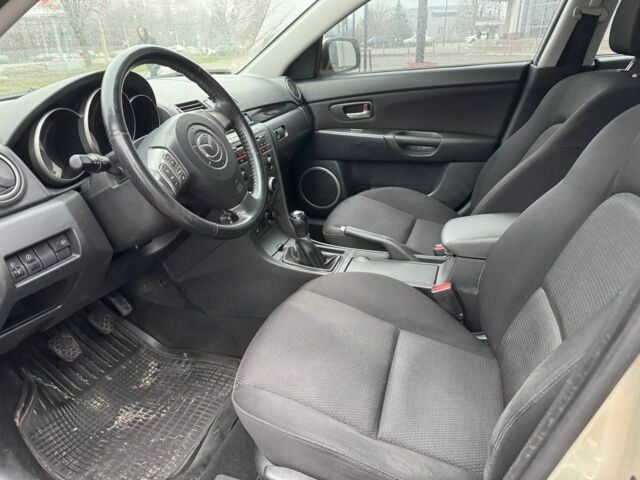 Бежевый Мазда 3, объемом двигателя 1.6 л и пробегом 161 тыс. км за 4999 $, фото 9 на Automoto.ua