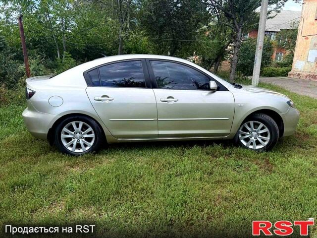 Бежевый Мазда 3, объемом двигателя 1.6 л и пробегом 220 тыс. км за 5600 $, фото 12 на Automoto.ua