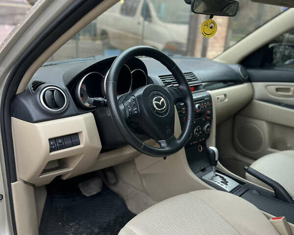 Бежевый Мазда 3, объемом двигателя 1.6 л и пробегом 135 тыс. км за 5199 $, фото 71 на Automoto.ua