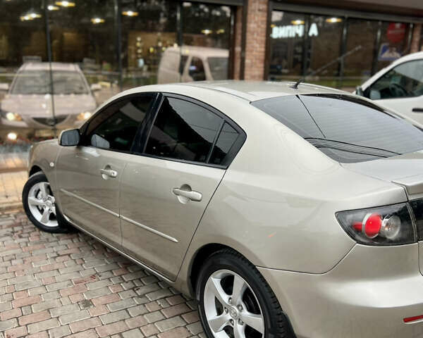 Бежевый Мазда 3, объемом двигателя 1.6 л и пробегом 135 тыс. км за 5199 $, фото 34 на Automoto.ua