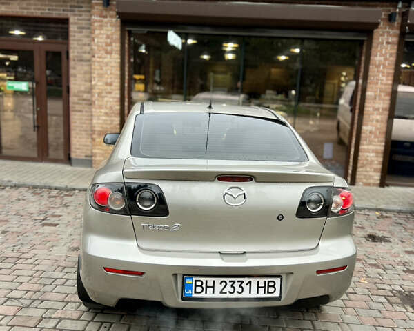 Бежевый Мазда 3, объемом двигателя 1.6 л и пробегом 135 тыс. км за 5199 $, фото 31 на Automoto.ua