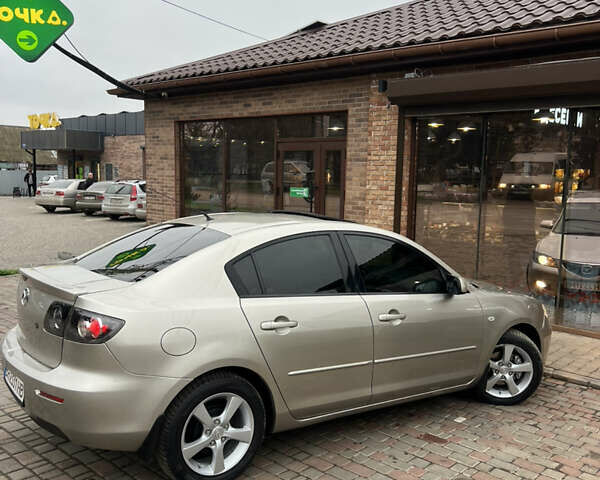 Бежевый Мазда 3, объемом двигателя 1.6 л и пробегом 135 тыс. км за 5199 $, фото 17 на Automoto.ua