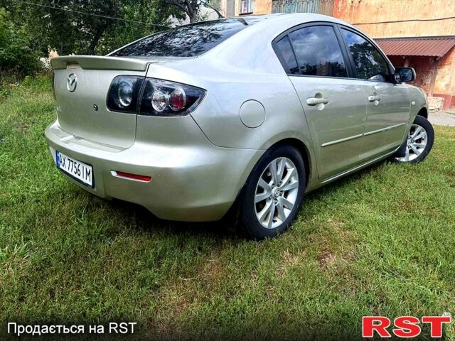 Бежевый Мазда 3, объемом двигателя 1.6 л и пробегом 220 тыс. км за 5600 $, фото 11 на Automoto.ua