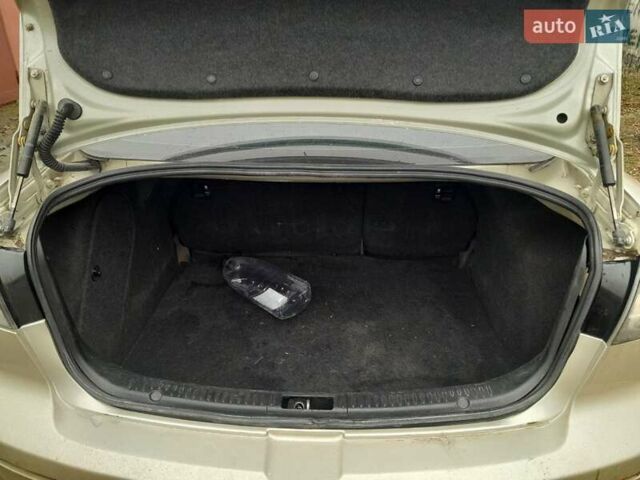 Бежевий Мазда 3, об'ємом двигуна 1.6 л та пробігом 200 тис. км за 4500 $, фото 9 на Automoto.ua