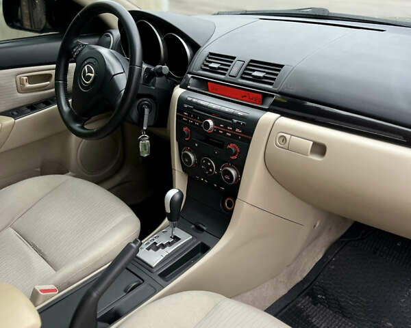 Бежевый Мазда 3, объемом двигателя 1.6 л и пробегом 135 тыс. км за 5199 $, фото 46 на Automoto.ua