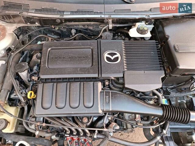 Бежевий Мазда 3, об'ємом двигуна 1.6 л та пробігом 280 тис. км за 4650 $, фото 22 на Automoto.ua