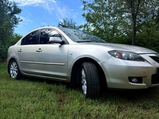 Бежевый Мазда 3, объемом двигателя 1.6 л и пробегом 220 тыс. км за 5600 $, фото 5 на Automoto.ua