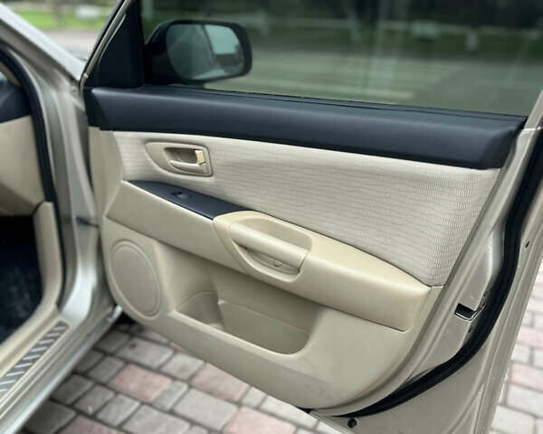 Бежевый Мазда 3, объемом двигателя 1.6 л и пробегом 135 тыс. км за 5199 $, фото 52 на Automoto.ua