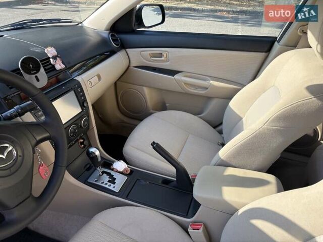 Бежевий Мазда 3, об'ємом двигуна 1.6 л та пробігом 147 тис. км за 5999 $, фото 13 на Automoto.ua