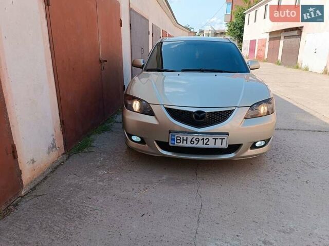 Бежевий Мазда 3, об'ємом двигуна 1.6 л та пробігом 280 тис. км за 4650 $, фото 15 на Automoto.ua