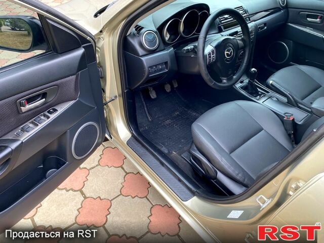 Бежевый Мазда 3, объемом двигателя 1.6 л и пробегом 178 тыс. км за 5200 $, фото 3 на Automoto.ua