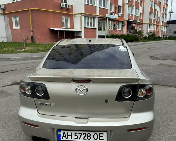 Бежевий Мазда 3, об'ємом двигуна 1.6 л та пробігом 166 тис. км за 7800 $, фото 7 на Automoto.ua