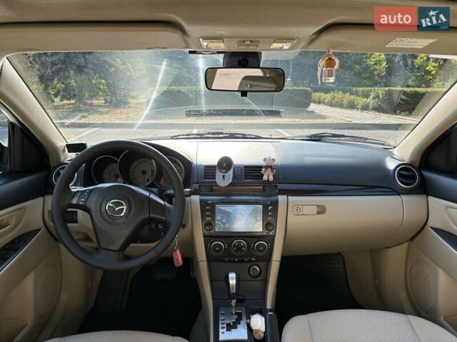 Бежевий Мазда 3, об'ємом двигуна 1.6 л та пробігом 147 тис. км за 5999 $, фото 17 на Automoto.ua