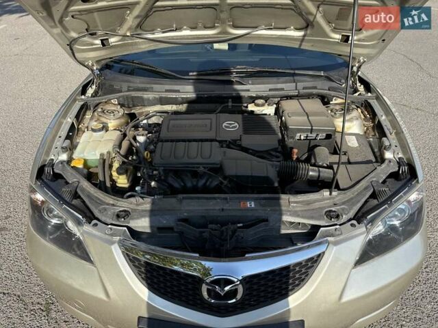 Бежевий Мазда 3, об'ємом двигуна 1.6 л та пробігом 147 тис. км за 5999 $, фото 12 на Automoto.ua