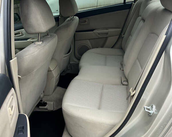 Бежевый Мазда 3, объемом двигателя 1.6 л и пробегом 135 тыс. км за 5199 $, фото 76 на Automoto.ua