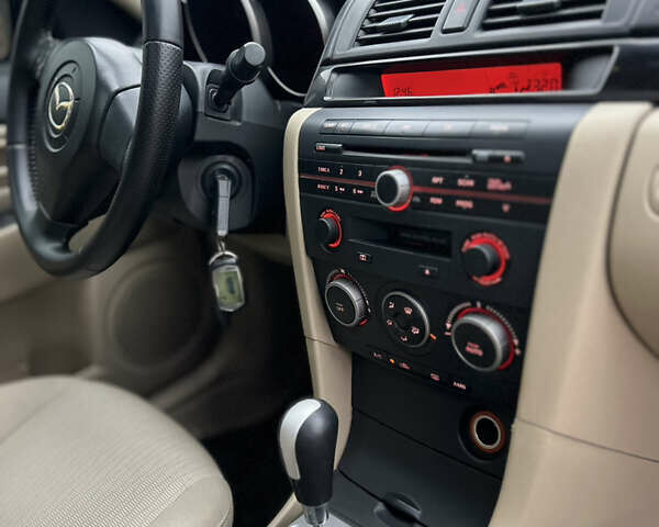 Бежевый Мазда 3, объемом двигателя 1.6 л и пробегом 135 тыс. км за 5199 $, фото 48 на Automoto.ua