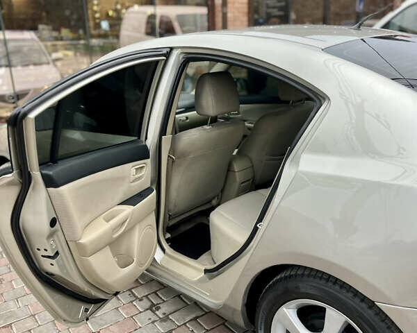 Бежевый Мазда 3, объемом двигателя 1.6 л и пробегом 135 тыс. км за 5199 $, фото 78 на Automoto.ua