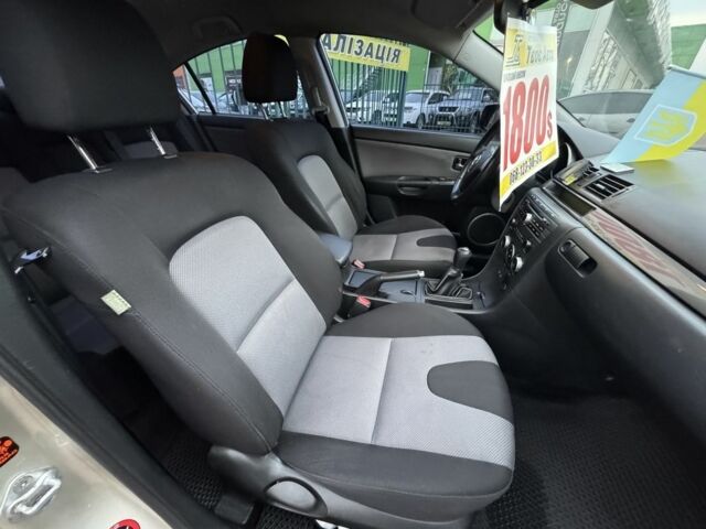 Бежевый Мазда 3, объемом двигателя 2 л и пробегом 184 тыс. км за 5350 $, фото 12 на Automoto.ua