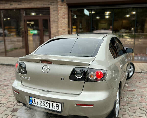 Бежевый Мазда 3, объемом двигателя 1.6 л и пробегом 135 тыс. км за 5199 $, фото 18 на Automoto.ua