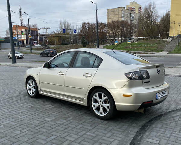 Бежевый Мазда 3, объемом двигателя 2 л и пробегом 214 тыс. км за 4750 $, фото 5 на Automoto.ua
