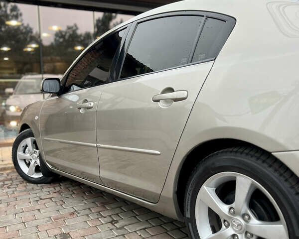 Бежевый Мазда 3, объемом двигателя 1.6 л и пробегом 135 тыс. км за 5199 $, фото 30 на Automoto.ua