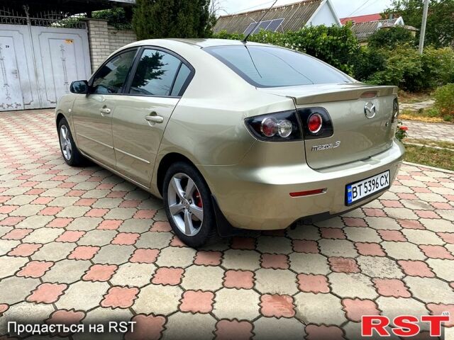 Бежевый Мазда 3, объемом двигателя 1.6 л и пробегом 178 тыс. км за 5200 $, фото 1 на Automoto.ua