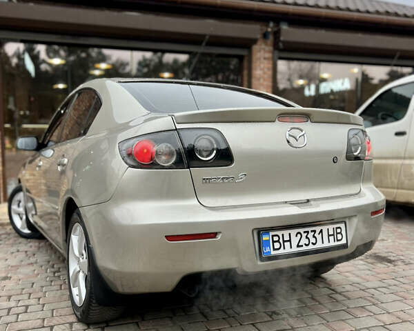 Бежевый Мазда 3, объемом двигателя 1.6 л и пробегом 135 тыс. км за 5199 $, фото 28 на Automoto.ua