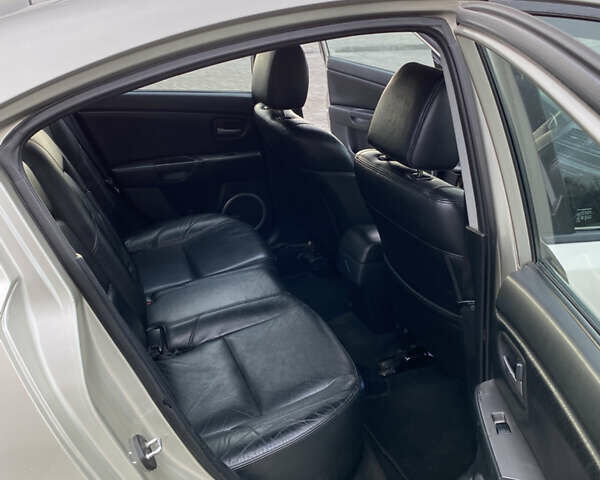 Бежевый Мазда 3, объемом двигателя 2 л и пробегом 214 тыс. км за 4750 $, фото 13 на Automoto.ua