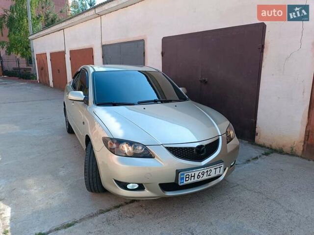 Бежевый Мазда 3, объемом двигателя 1.6 л и пробегом 280 тыс. км за 4999 $, фото 6 на Automoto.ua