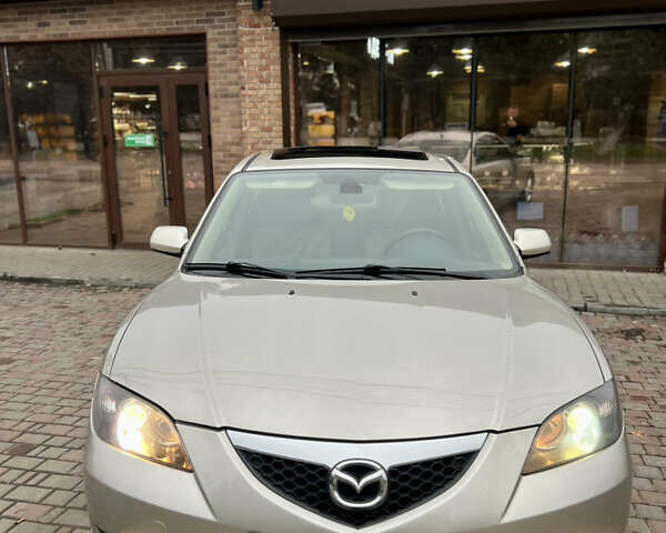 Бежевый Мазда 3, объемом двигателя 1.6 л и пробегом 135 тыс. км за 5199 $, фото 1 на Automoto.ua