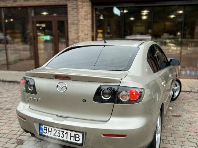 Бежевий Мазда 3, об'ємом двигуна 1.6 л та пробігом 135 тис. км за 5199 $, фото 7 на Automoto.ua