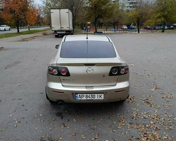 Бежевый Мазда 3, объемом двигателя 1.59 л и пробегом 171 тыс. км за 4350 $, фото 1 на Automoto.ua