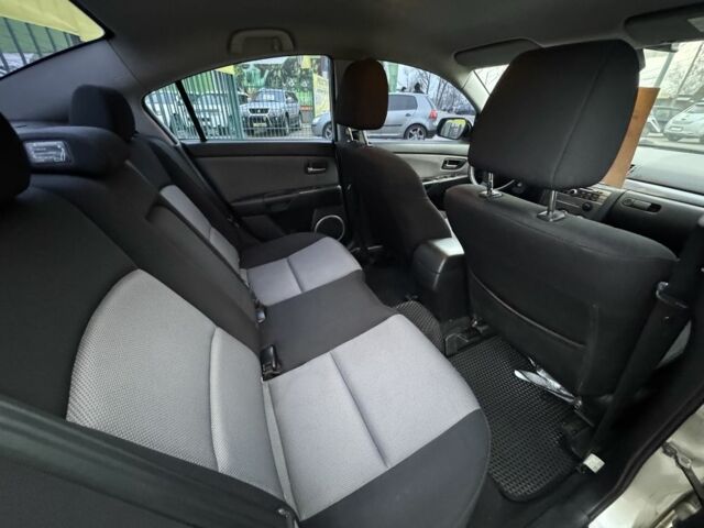 Бежевый Мазда 3, объемом двигателя 2 л и пробегом 184 тыс. км за 5350 $, фото 11 на Automoto.ua