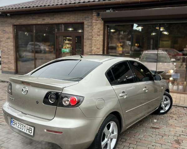 Бежевый Мазда 3, объемом двигателя 1.6 л и пробегом 135 тыс. км за 5199 $, фото 23 на Automoto.ua