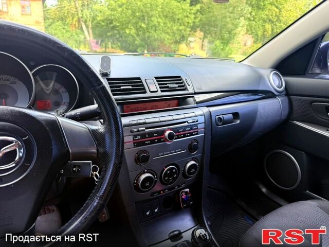 Бежевый Мазда 3, объемом двигателя 1.6 л и пробегом 220 тыс. км за 5600 $, фото 1 на Automoto.ua