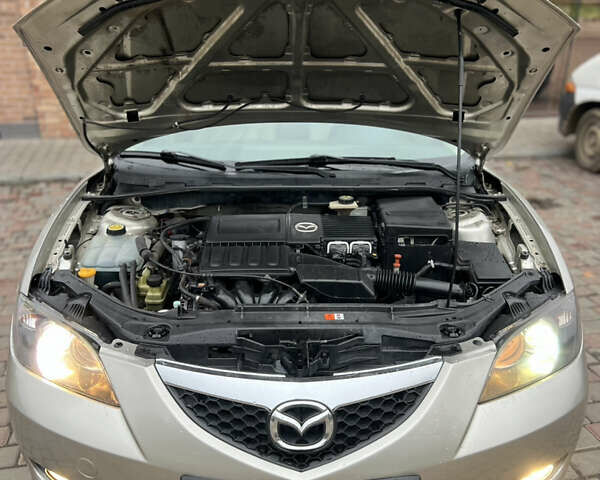 Бежевый Мазда 3, объемом двигателя 1.6 л и пробегом 135 тыс. км за 5199 $, фото 35 на Automoto.ua