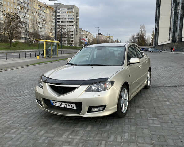 Бежевый Мазда 3, объемом двигателя 2 л и пробегом 214 тыс. км за 4750 $, фото 2 на Automoto.ua