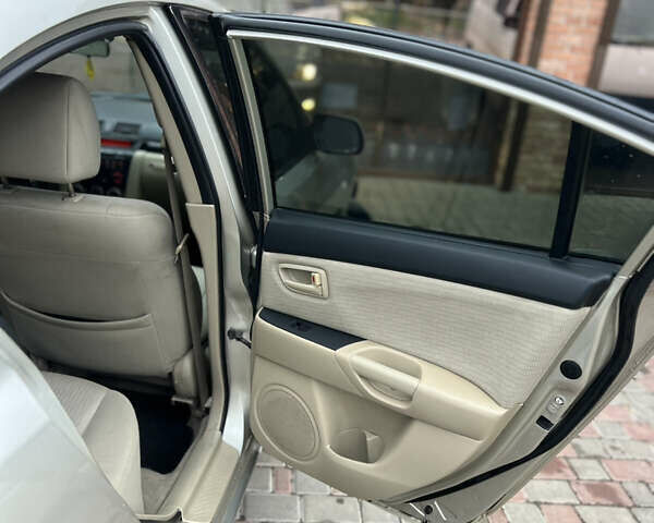 Бежевый Мазда 3, объемом двигателя 1.6 л и пробегом 135 тыс. км за 5199 $, фото 63 на Automoto.ua