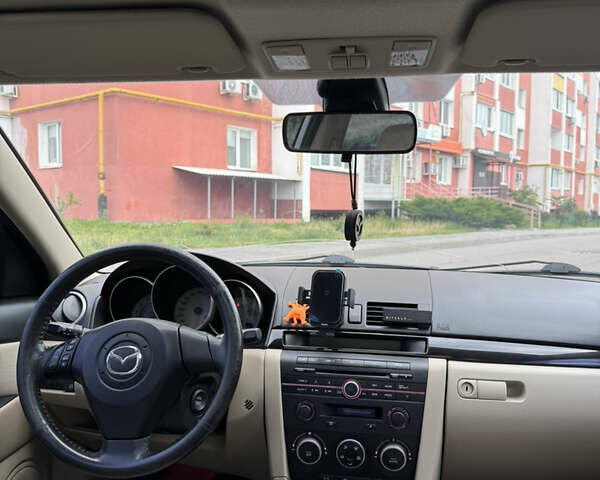 Бежевий Мазда 3, об'ємом двигуна 1.6 л та пробігом 166 тис. км за 7800 $, фото 13 на Automoto.ua