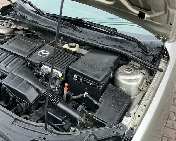 Бежевый Мазда 3, объемом двигателя 1.6 л и пробегом 135 тыс. км за 5199 $, фото 38 на Automoto.ua