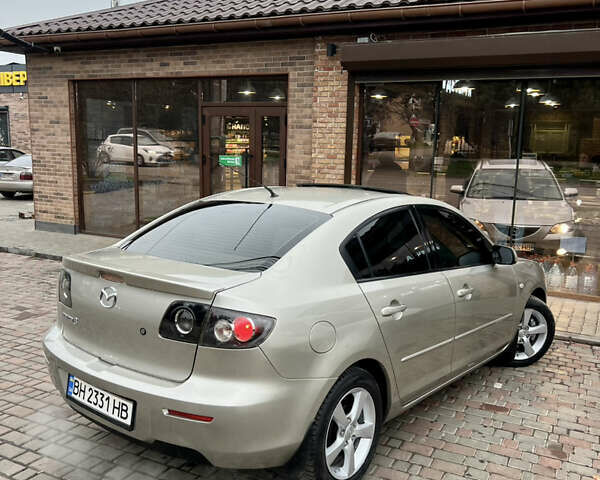 Бежевый Мазда 3, объемом двигателя 1.6 л и пробегом 135 тыс. км за 5199 $, фото 19 на Automoto.ua