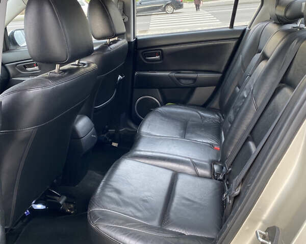 Бежевый Мазда 3, объемом двигателя 2 л и пробегом 214 тыс. км за 4750 $, фото 11 на Automoto.ua