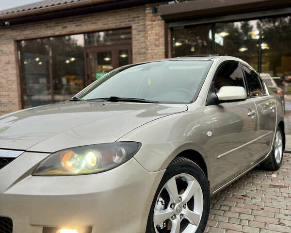 Бежевый Мазда 3, объемом двигателя 1.6 л и пробегом 135 тыс. км за 5199 $, фото 5 на Automoto.ua