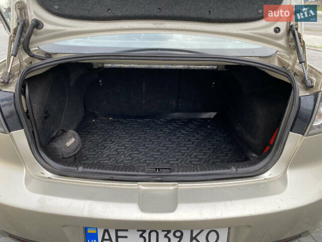 Бежевый Мазда 3, объемом двигателя 2 л и пробегом 214 тыс. км за 4750 $, фото 16 на Automoto.ua