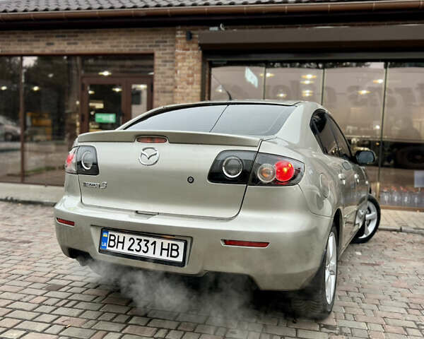 Бежевый Мазда 3, объемом двигателя 1.6 л и пробегом 135 тыс. км за 5199 $, фото 20 на Automoto.ua