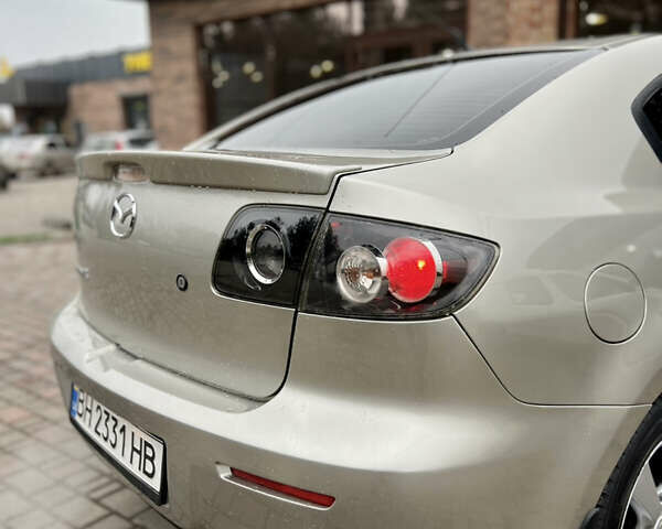 Бежевый Мазда 3, объемом двигателя 1.6 л и пробегом 135 тыс. км за 5199 $, фото 14 на Automoto.ua